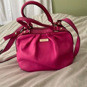 Pink Kate Spade crossbody purse.